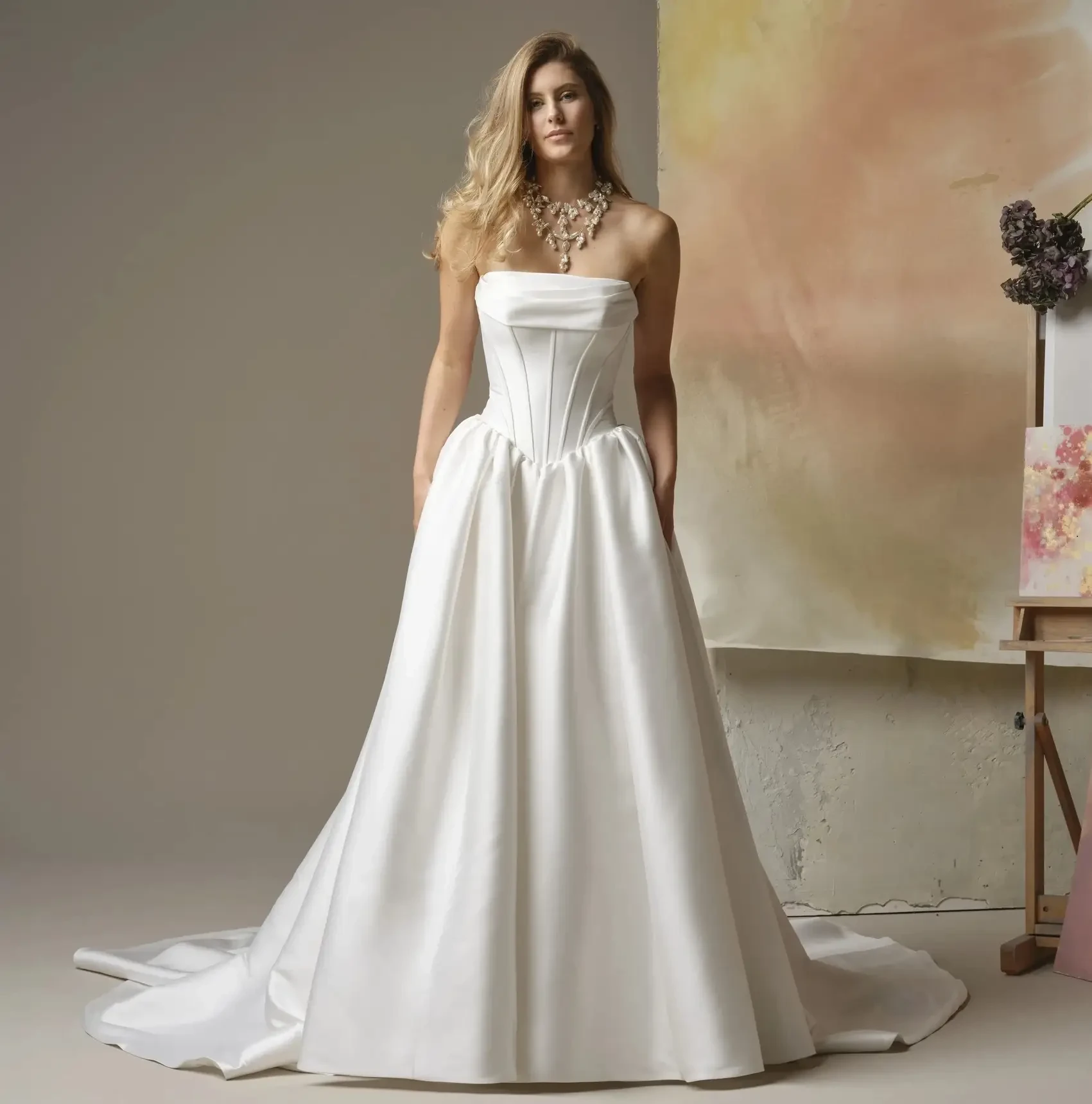 Models wearing a white dress