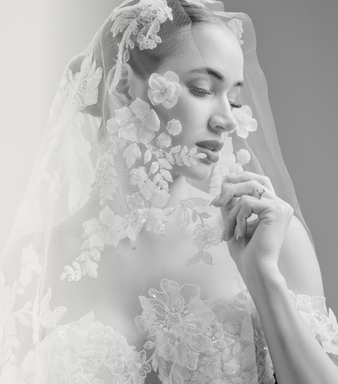 Photo of the model wearing a white bridal gown